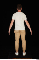  Trent brown trousers casual dressed standing white sneakers white t shirt whole body 0005.jpg